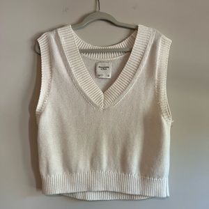 White sweater vest